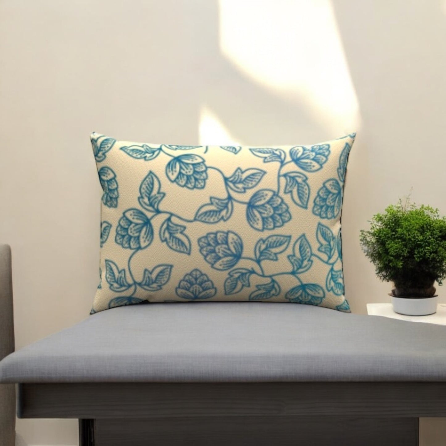 Enhance your decor with the Blu Leaves Cotton Lumbar Pillow, featuring elegant floral designs perfect for any room.