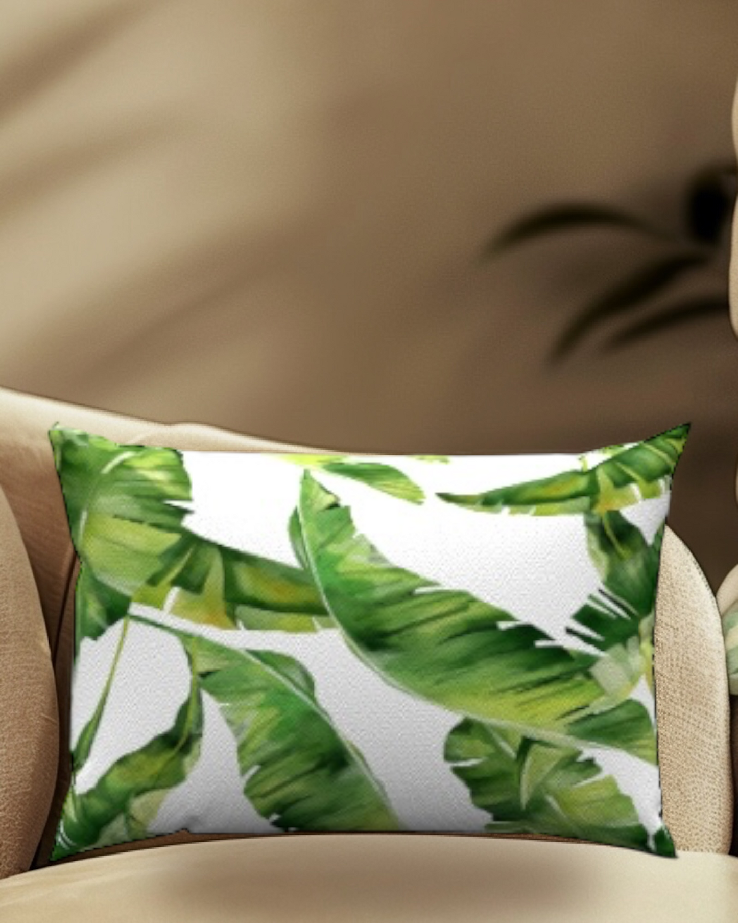 Palm Cotton Lumbar Pillow with green palm leaf design on snow velvet couch, enhancing cozy living spaces at AllModern.