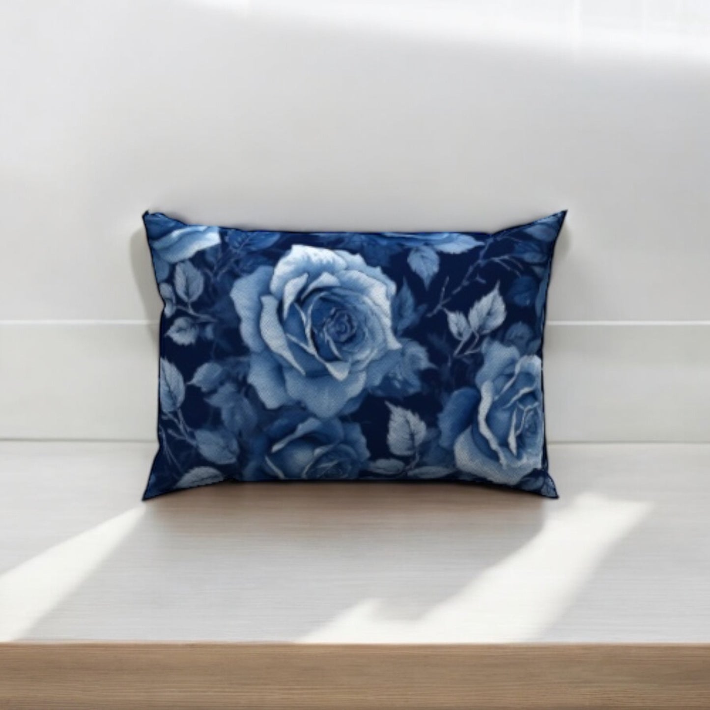 Rosalie Cotton Lumbar Pillow with elegant blue rose pattern adds plush support and style to any living space.