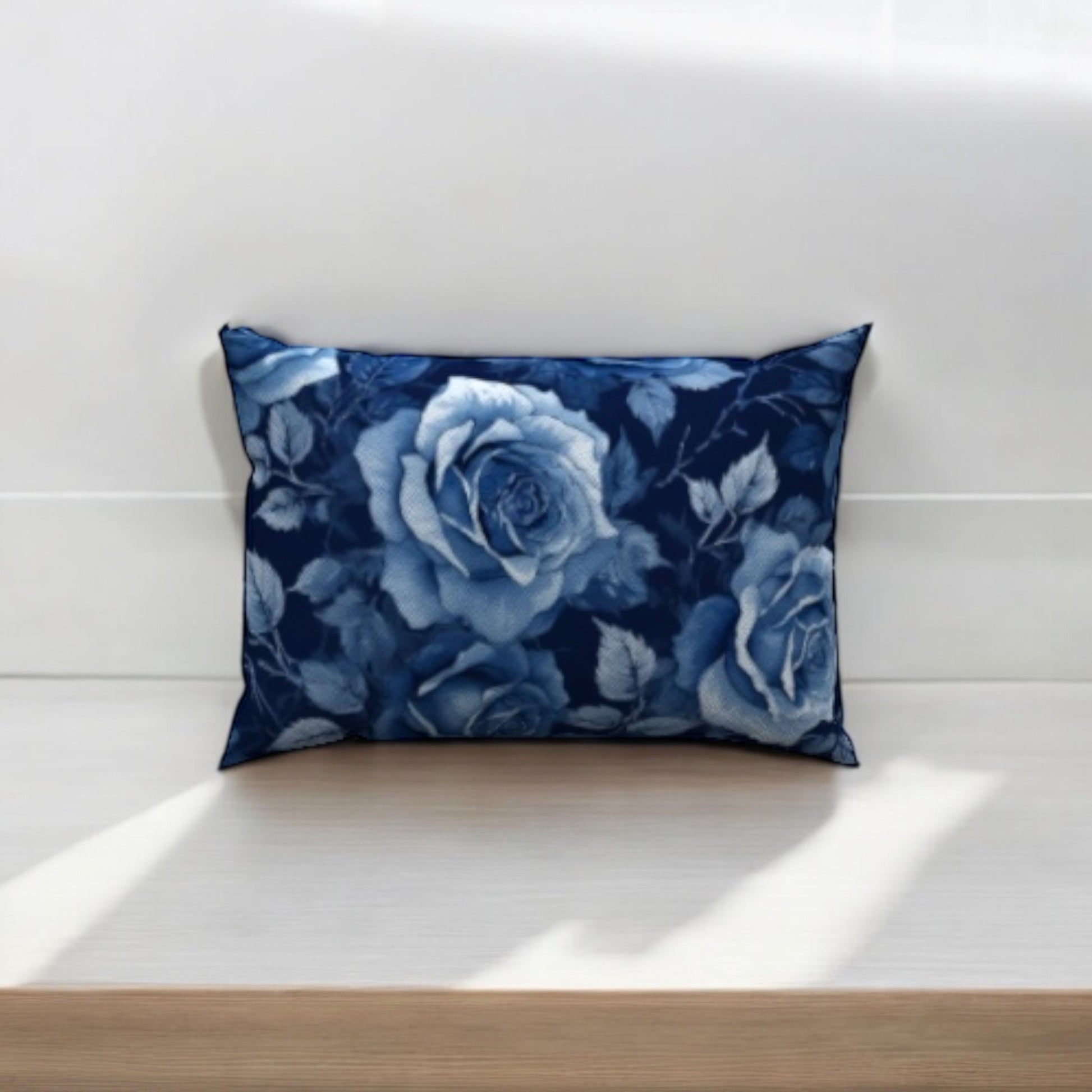 Rosalie Cotton Lumbar Pillow with elegant blue rose pattern adds plush support and style to any living space.