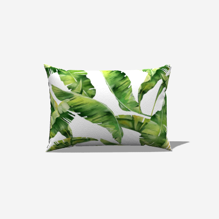 Palm Cotton Lumbar Pillow with green palm leaves pattern enhances cozy, stylish decor for snow velvet couches.