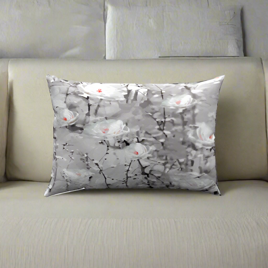 Wonderland Cotton Lumbar Pillow showcases a whimsical white floral design, perfect for cozying up your living space.
