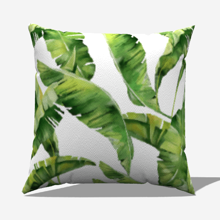 Lush green leaves adorn the Palm Cotton Throw Pillow, adding a natural touch to your home decor.
